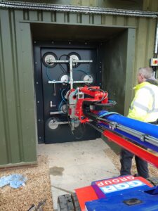 A blast door being installed